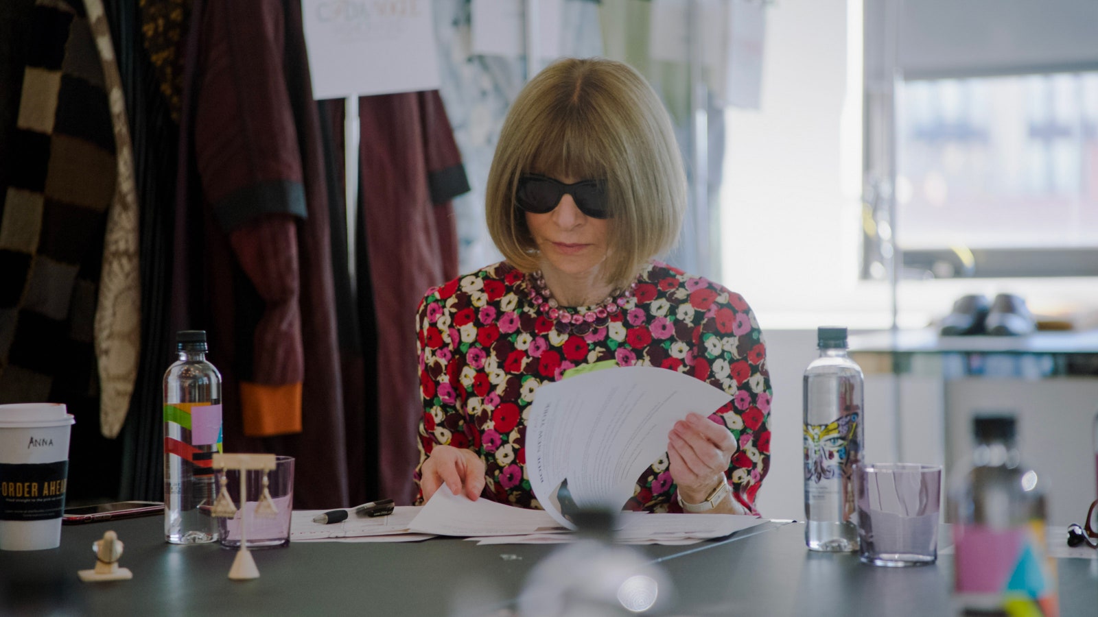 Image may contain Anna Wintour Human Person Sunglasses Accessories Accessory Sitting Home Decor Furniture and Table